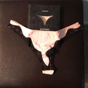 Boxed THONG PINK with black lace (in original box). NEVER WORN